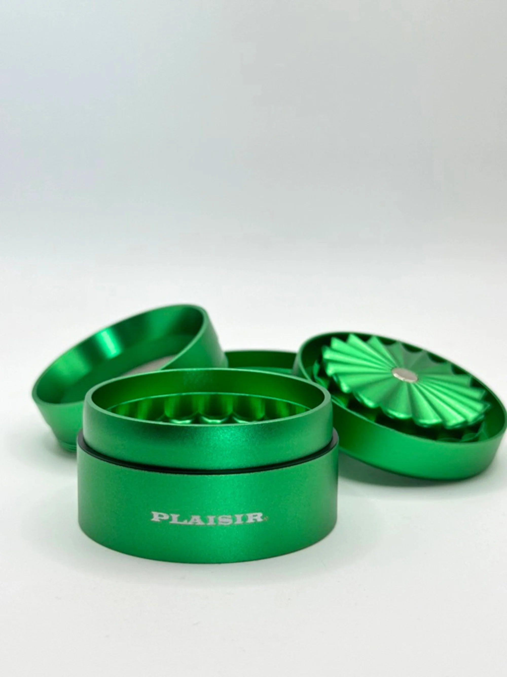 Plaisir Grinder mit integriertem Magnetverschluss aus Aluminium in Grün